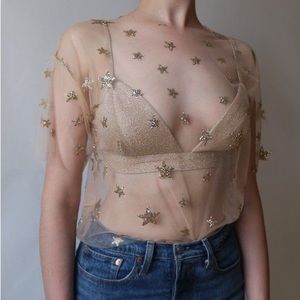 Lirika Matoshi Stars in Her Eyes top in gold